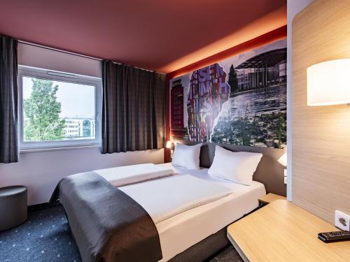 Gulta vai gultas numurā naktsmītnē B&B HOTEL München-Messe