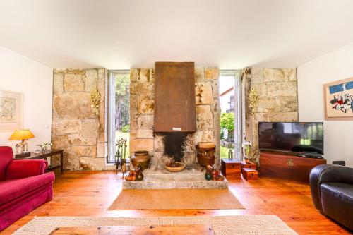 A seating area at Portugal Active Oliveiras Farm