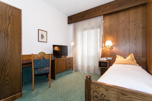 صورة لـ Hotel Am Wolfgrubenersee في سوبرابولسانو