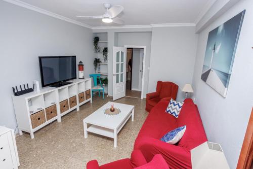 Uma TV ou centro de entretenimento em Apartamento Playa Santa María del Mar