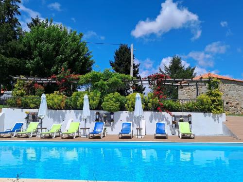 A piscina localizada em Alqueiturismo - Casas de Campo ou nos arredores