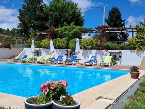 A piscina localizada em Alqueiturismo - Casas de Campo ou nos arredores