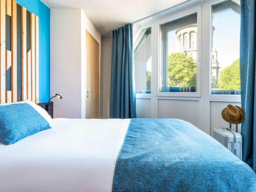 Giường trong phòng chung tại ibis Styles Boulogne sur Mer Centre Cathédrale