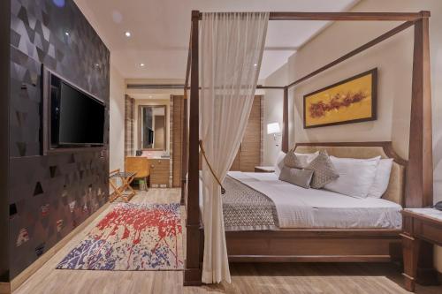 Tempat tidur dalam kamar di Residency Hotel Fort