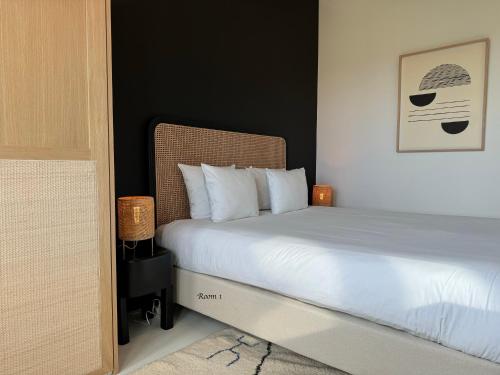 A bed or beds in a room at 3 Room Luxury Design Apartment with Airconditioning, Close to Gent St-Pieters Station