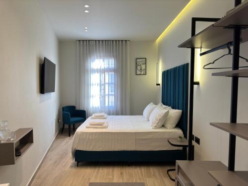 Кровать или кровати в номере The cosy inn vlora