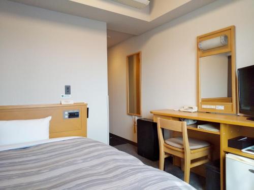 Cama ou camas em um quarto em Hotel Route-Inn Sanofujioka Inter