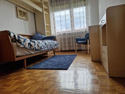 Ruang duduk di GreenFamilyAppartment near Ljubljana