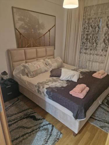 Postel nebo postele na pokoji v ubytování Apartment Lux Lomina