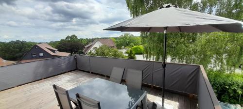 En balkong eller terrasse på FeWoaufdemAdenberg