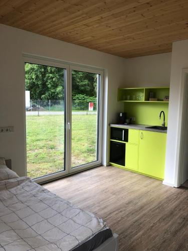 Kuhinja oz. manjša kuhinja v nastanitvi Appartement am Stadthafen