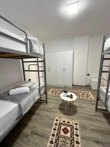 Кровать или кровати в номере Hostel Leon