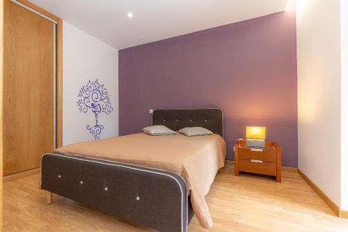 Cama ou camas em um quarto em Atlantic Nest Coimbra