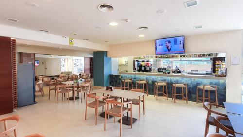 The lounge or bar area at Hotel Cesar Augustus