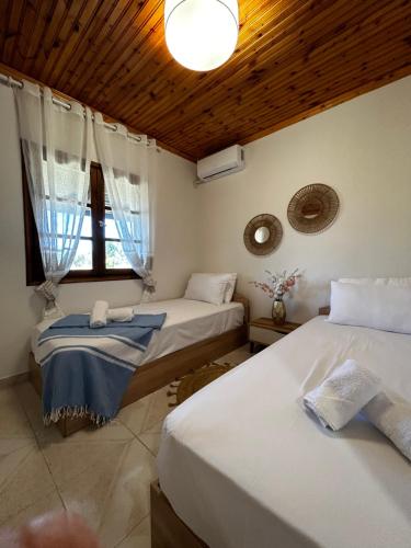 Tempat tidur dalam kamar di Small Paradise Perfect Hospitality