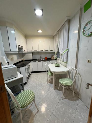 A cozinha ou cozinha compacta de Apartamento Arenal