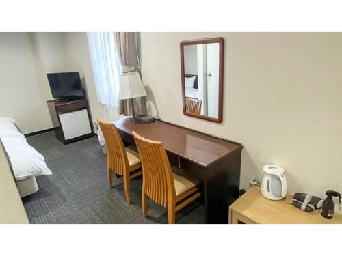 Телевизор и/или развлекательный центр в Takatsuki W&M Hotel - Vacation STAY 48536v