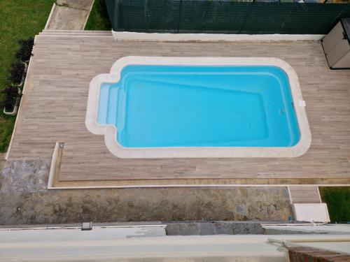 an overhead view of a swimming pool on a deck at Casa La Quintana in Castro-Urdiales