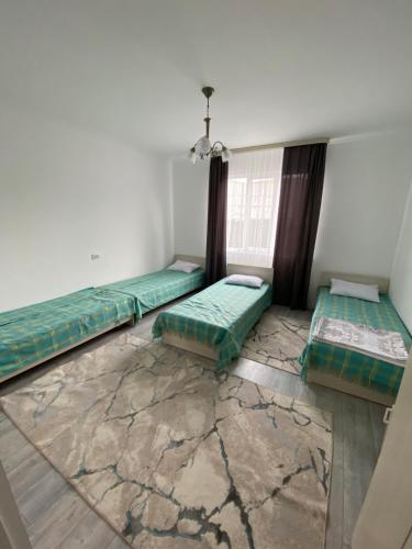 Krevet ili kreveti u jedinici u objektu Ni Guest House