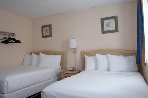 Katil atau katil-katil dalam bilik di Madison Resort Wildwood Crest