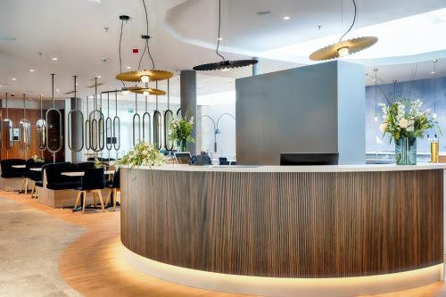 Welcome Parkhotel Bochum tesisinde bir restoran veya yemek mekanı