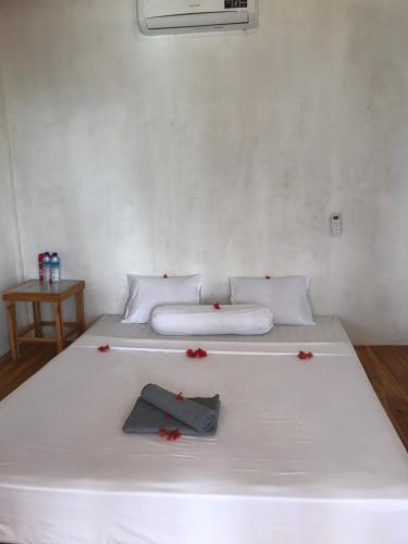 A bed or beds in a room at Gili Gede house