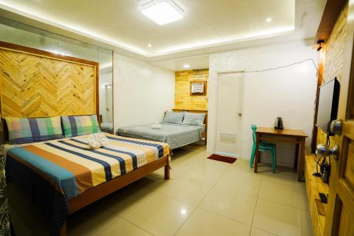 Katil atau katil-katil dalam bilik di JEMZ Tagaytay Budget Rooms