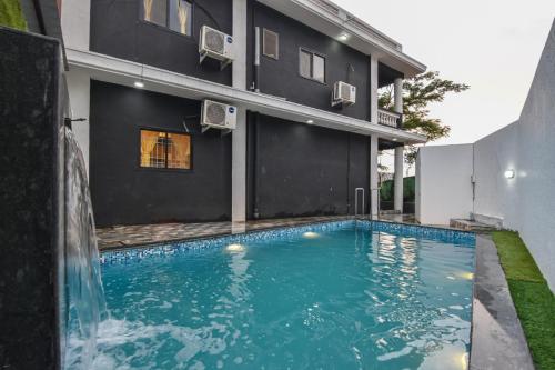 La alberca dentro o cerca de EMPYREAN STAY ll 3BHK ll JAGUAR VILLA ll AC ll POOL ll