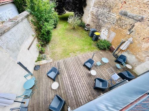 Un lugar para sentarse en Le République - Logements avec jardin situés en plein cœur de ville et proche des thermes