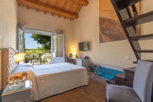 A bed or beds in a room at Aquae Sinis Albergo Diffuso