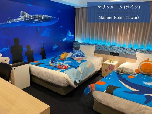 Ліжко або ліжка в номері Henn na Hotel Kagoshima Tenmonkan