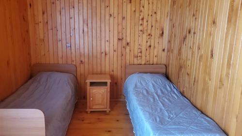 Cama ou camas em um quarto em Holiday Cottage in Ureki, Georgia