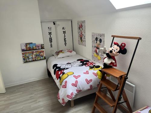 Кровать или кровати в номере maison agréable pour 6 a 5 mm de Disney