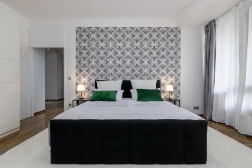 מיטה או מיטות בחדר ב-Highlife Apartment One Wiesbaden Wilhelmstraße