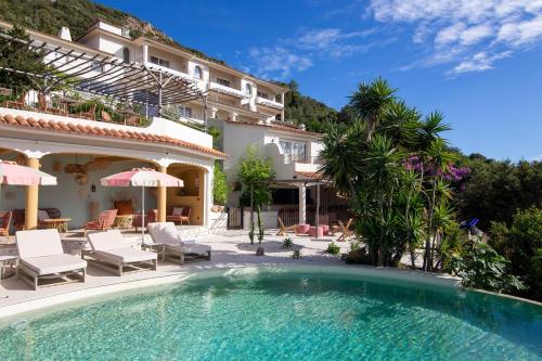 The swimming pool at or close to Hotel Riva Beach