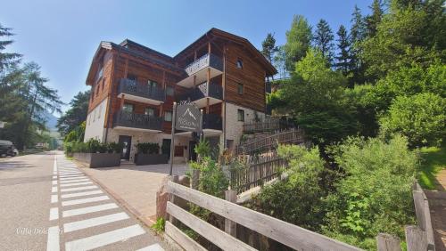 a building on the side of a street at Villa Dolomiti in Ortisei