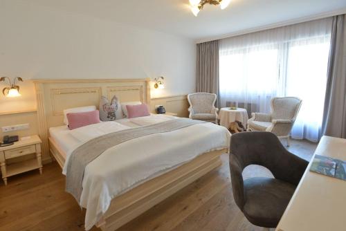 Giường trong phòng chung tại Ferienwelt Kesselgrub Hotel in Altenmarkt-Zauchensee