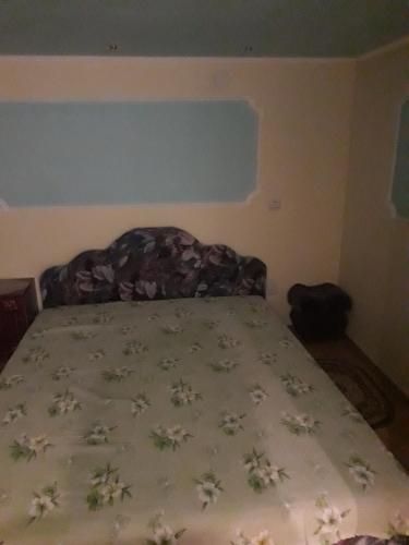 A bed or beds in a room at Тушер