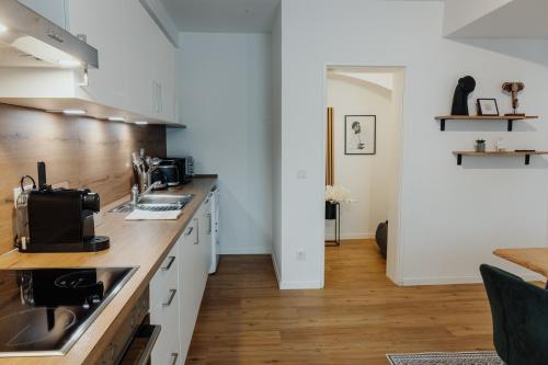 Η κουζίνα ή μικρή κουζίνα στο CityHeart Appartement - Stadt Mitte - Stilvoll