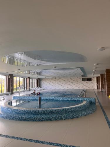 Piscina en o cerca de Apartament Avalon SPA Dziwnów - basen sauna fitness