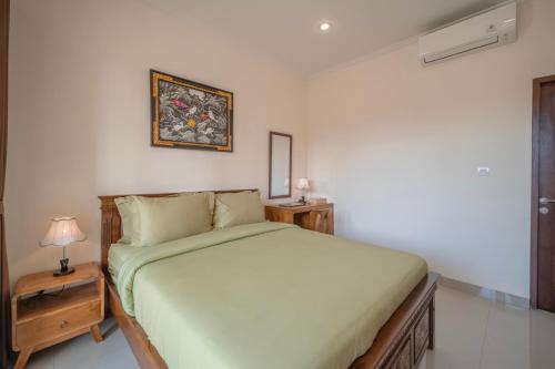 Katil atau katil-katil dalam bilik di Titeng Guest House - Comfortable studio in amazing location near Potato Head and the beach