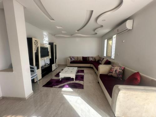 Кът за сядане в Appartement souai