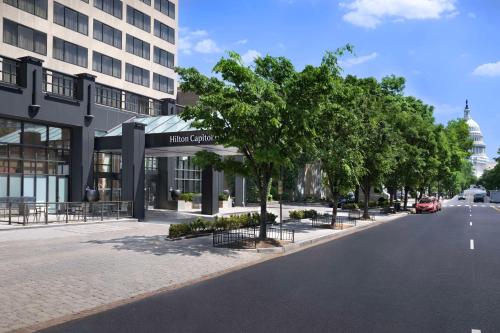 a rendering of a street in front of a building at Hilton Washington DC Capitol Hill in Washington