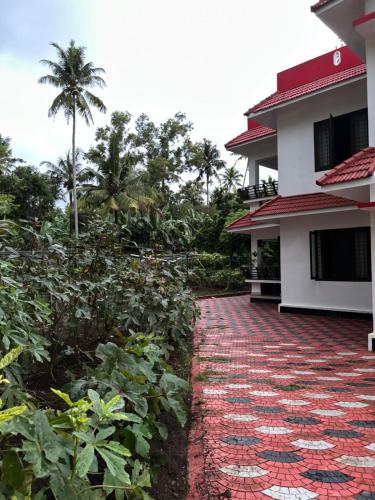 Un jardín fuera de Garden Villa Varkala