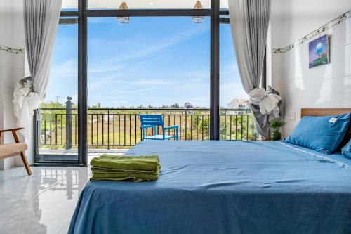 Krevet ili kreveti u jedinici u okviru objekta Nalani Homestay & Hostel Hoi An