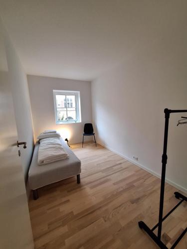 En eller flere senger på et rom på Apartments on Kongensgade