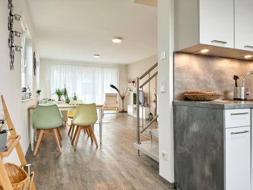 A cozinha ou cozinha compacta de Maisonette-Wohnung in Norderstedt