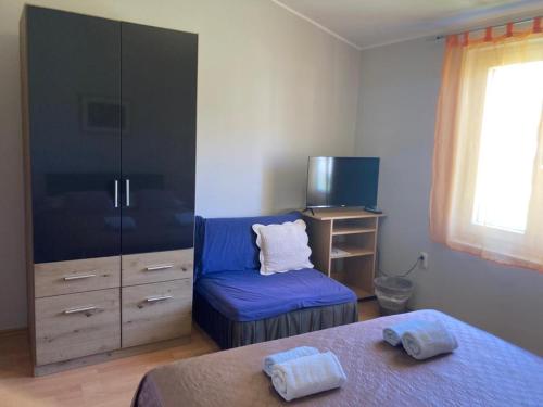 Voodi või voodid majutusasutuse Apartments & Rooms Krecak Sibenik toas