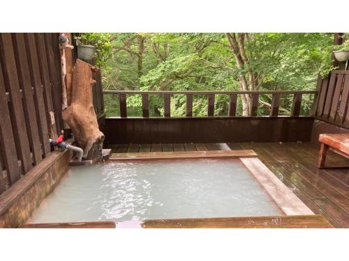 a pool of water on the deck of a house at Shinyu Onsen Kurikomaso - Vacation STAY 04615v in Kurihara