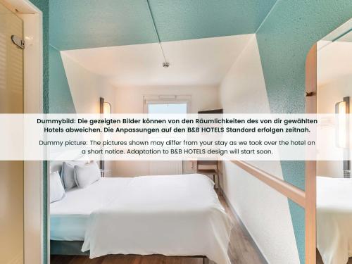 B&B HOTEL Erlangen-Tennenlohe房間的床